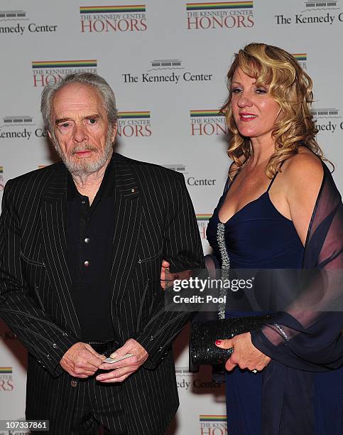 Merle Haggard, one of the 2010 Kennedy Center honorees, arrives with his wife, Theresa Ann Lane, for the formal artist's dinner for the Kennedy...