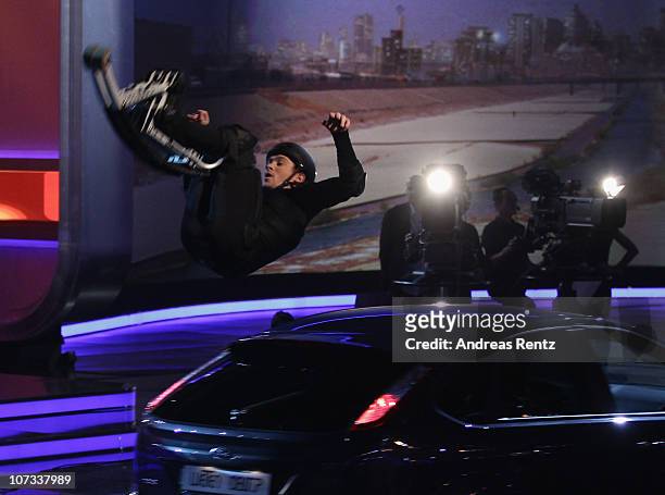 Samuel Koch jumps over the third car of five cars during the 192th 'Wetten, dass ...?' show at the exhibition hall Dusseldorf on December 4, 2010 in...