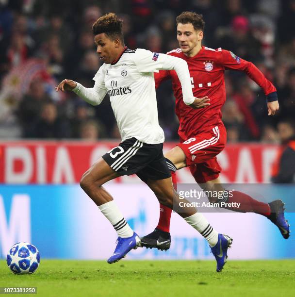 Gedson Fernandes of SL Benifica is challenged by Leon Goretzka of Bayern Munich during the Group E match of the UEFA Champions League between FC...