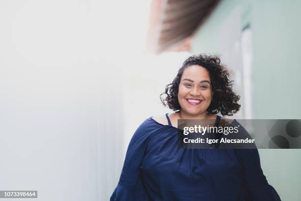 natural portrait of a woman feeling good - big fat women stock pictures, royalty-free photos & images