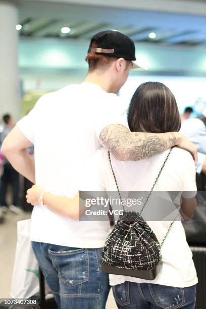 Chinese actor Jiang Jinfu and Japanese model Haruka Nakaura arrive at Beijing Capital International Airport on September 13, 2018 in Beijing, China.