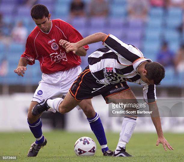 David Terminello of Adelaide City and Ante Deur of Sydney United compete for the ball during the NSL match between Sydney United and Adelaide City...