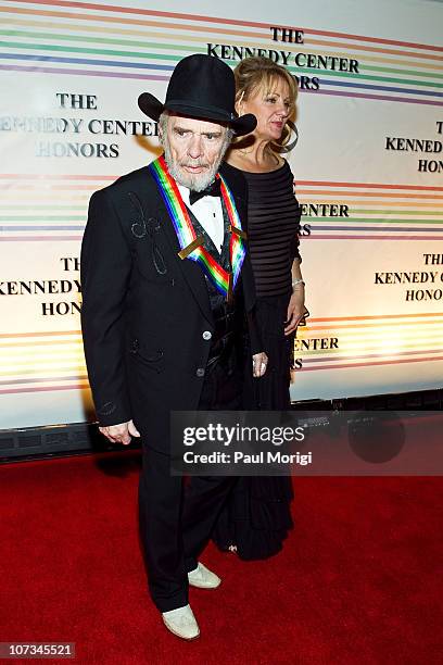 Merle Haggard and Theresa Ann Lane arrive at the 33rd Annual Kennedy Center Honors at the Kennedy Center Hall of States on December 5, 2010 in...