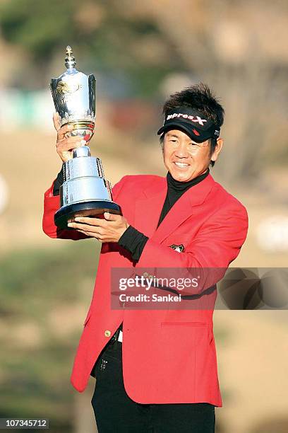 Hiroyuki Fujita poses with trophy after winning the 47th Golf Japan Series JT Cup at Tokyo Yomiuri Country Club on December 5, 2010 in Tokyo, Japan.