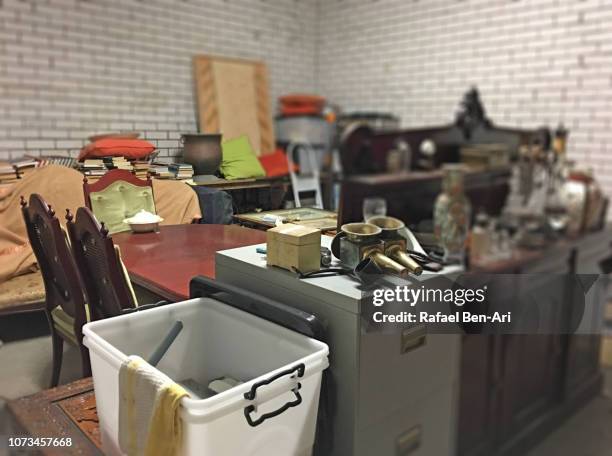 messy storage room - seminterrato foto e immagini stock