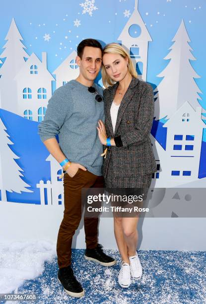 John Krause and Molly McCook attend Instagram's #Instaskate 2018 at LA Kings Holiday Ice LA Live on November 27, 2018 in Los Angeles, California.