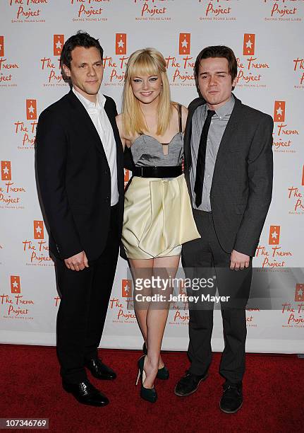 Will Gluck, Emma Stone and Dan Byrd arrive at the Trevor Live Benefiting The Trevor Project at Hollywood Palladium on December 5, 2010 in Hollywood,...