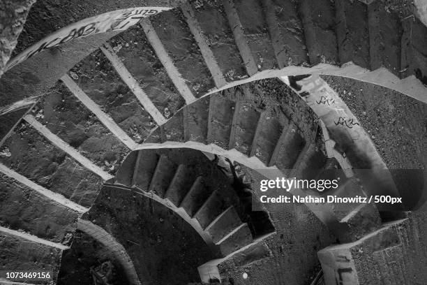 dark staircase, escher style - escher stairs stock pictures, royalty-free photos & images
