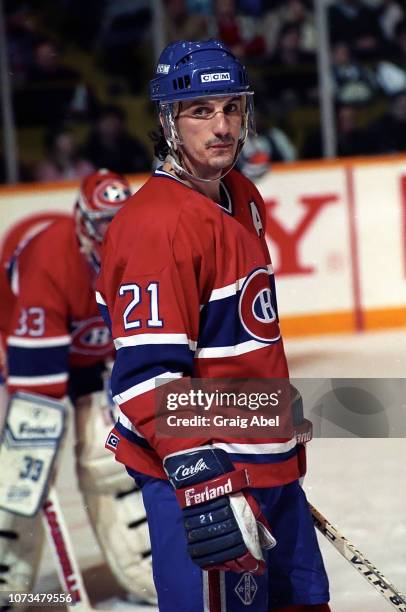 Guy Carbonneau of the Montreal Canadiens skates against the Toronto Maple Leafs during NHL game action on December 9, 1989 at Maple Leaf Gardens in...