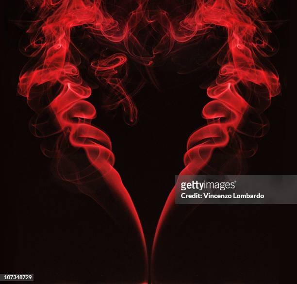 heart shaped smoke - smoke heart stock-fotos und bilder