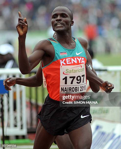Kenyas Soy Edwin crosses the finish line past teammate Yator Vincent in the 5000M men final on August 1, 2010 on the fifth day the17th CAA African...