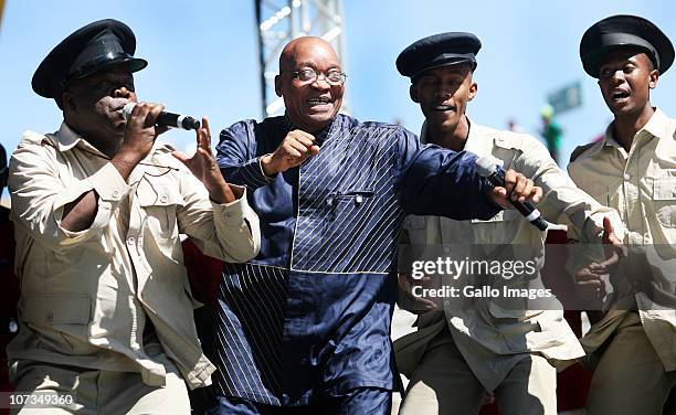 South African President Jacob Zuma dances during celebrations marking the 25th Anniversary of the Congress of South African Trade Unions on December...