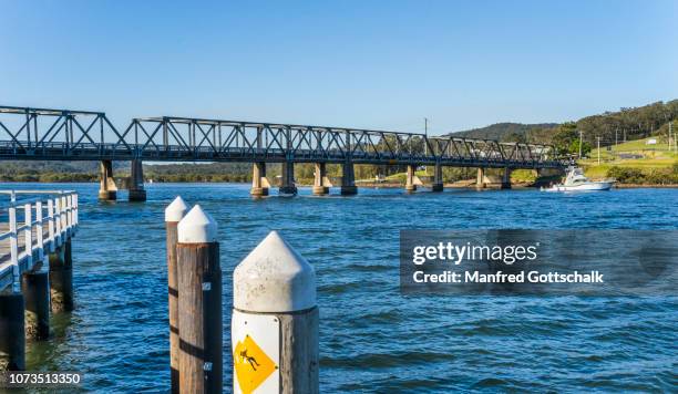 karuah river waterfront at sawyers point with view of karuah bridge, karuah, hunter region, mid north coast of new south wales, australia, november 1, 2016 - port stephens stock pictures, royalty-free photos & images