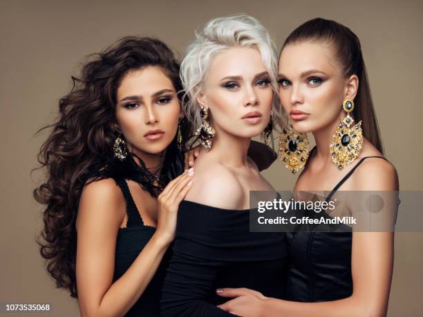 three beautiful girls with perfect hairstyle and make-up - hair model female stock pictures, royalty-free photos & images