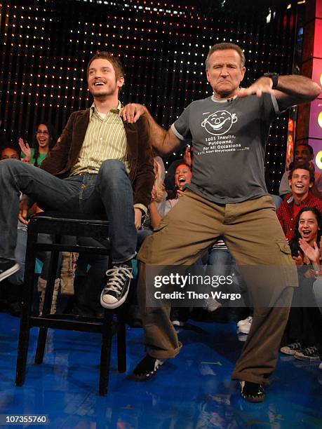 Elijah Wood and Robin Williams during Robin Williams, Elijah Wood, Snoop Dogg and Panic! at the Disco Visit MTVs TRL Gaming Week 2.0 at MTV Studios...