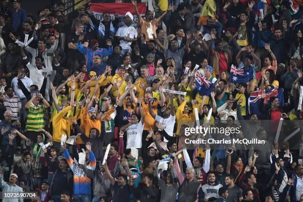 Fans react in the crowd during the FIH Men's Hockey World Cup Semi-Final match between Australia and the Netherlands at Kalinga Stadium on December...