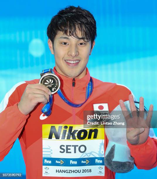 Gold medalist Daiya Seto of Japan poses with his medal during the medal ceremony for the Men's Medley 400m on day 5 of the 14th FINA World Swimming...