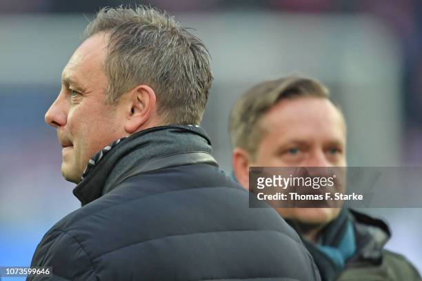 Manager Horst Heldt and head coach Andre Breitenreiter of Hannover look on prior to the Bundesliga match between Hannover 96 and FC Bayern Muenchen...