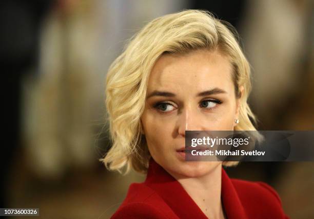 Russian pop singer Polina Gagarina looks on during the meeting with members of Presidential Council on Culture at Konstantin Palace in Strelna Saint...
