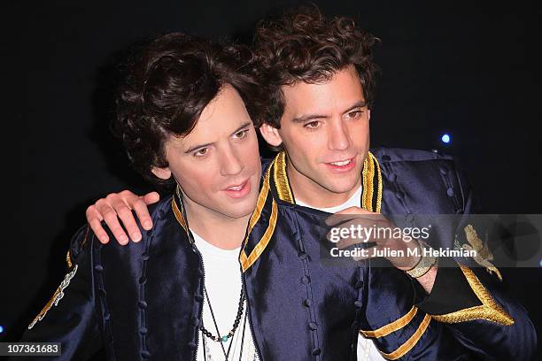 Mika poses with his waxwork at Musee Grevin on December 6, 2010 in Paris, France.