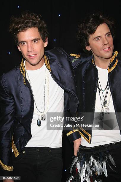 Mika poses with his waxwork at Musee Grevin on December 6, 2010 in Paris, France.