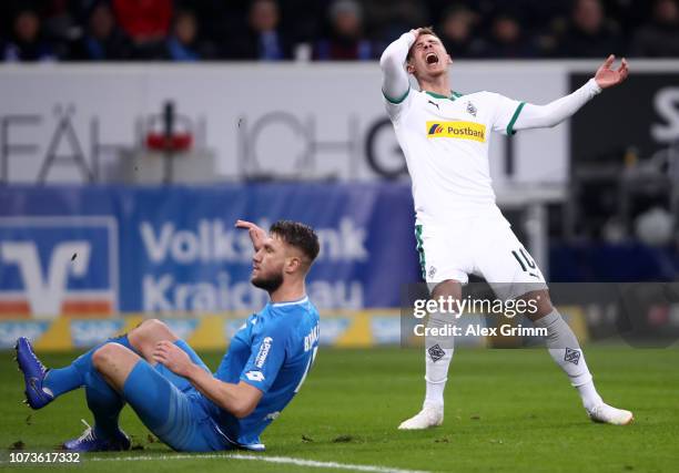 Daniel Baier of Augsburg reacts during the Bundesliga match between TSG 1899 Hoffenheim and Borussia Moenchengladbach at Wirsol Rhein-Neckar-Arena on...