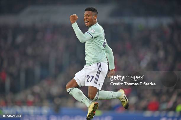 David Alaba of Muenchen celebrates his teams second goal during the Bundesliga match between Hannover 96 and FC Bayern Muenchen at HDI-Arena on...