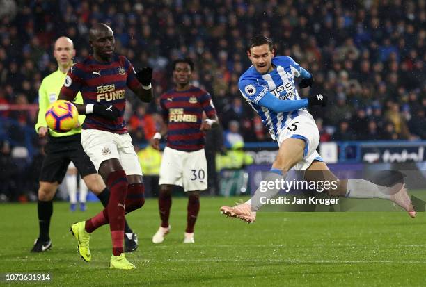 Chris Lowe of Huddersfield Town shoots during the Premier League match between Huddersfield Town and Newcastle United at John Smith's Stadium on...