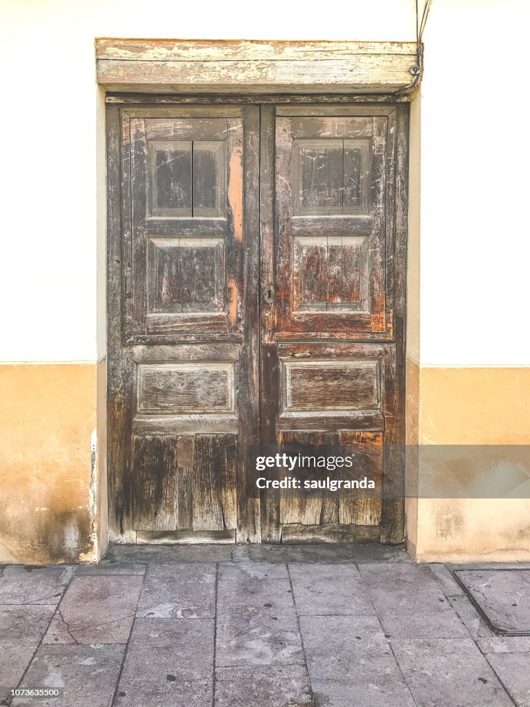 Front view of an old wooden door