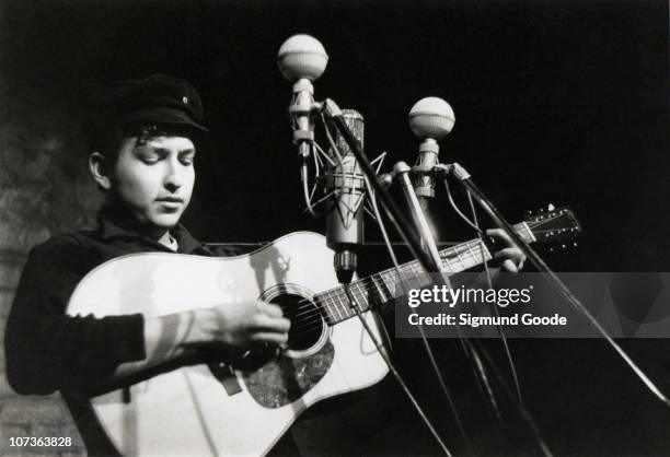 Bob Dylan performs at The Bitter End folk club in Greenwich Village in 1961 in New York City, New York.