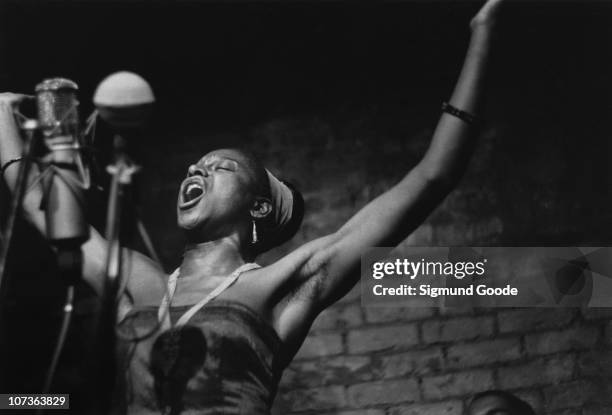 South African singer Miriam Makeba performs at The Bitter End folk club in Greenwich Village in 1961 in New York City, New York.