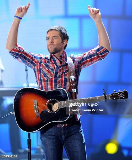 Musician Josh Turner performs onstage during the American Country Awards 2010 held at the MGM Grand Garden Arena on December 6, 2010 in Las Vegas,...