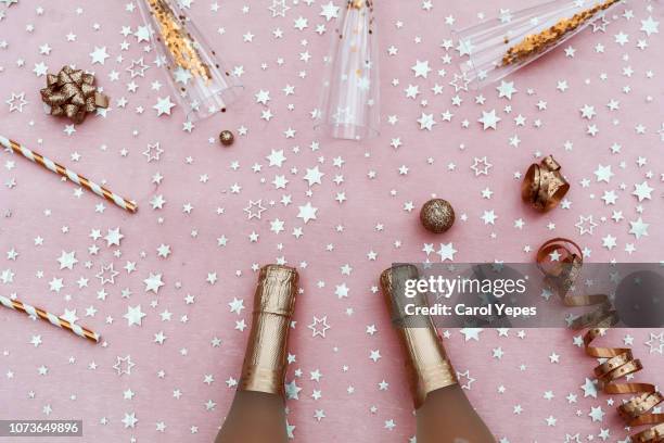 champagne and party items in pink.top view - pink champagne stock pictures, royalty-free photos & images