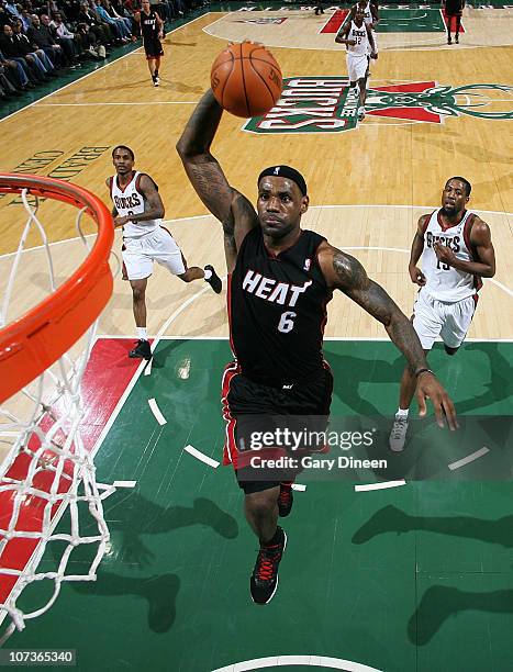 LeBron James of the Miami Heat dunks against the Milwaukee Bucks during the NBA game on December 6, 2010 at the Bradley Center in Milwaukee,...