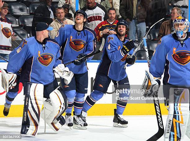 Zach Bogosian of the Atlanta Thrashers celebrates with Nik Antropov after scoring a goal in overtime against the Nashville Predators at Philips Arena...