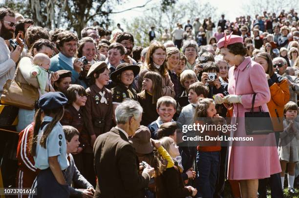 Queen Elizabeth II meets the public on a walkabout in Canberra, Australia, on October 10, 1982.