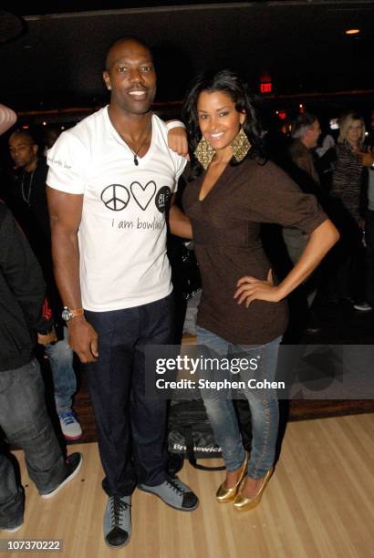 Terrell Owens and Claudia Jordan attend the 81 Cares Bowl presented by Terrell Owens and GQ Magazine at Star Lanes On The Levee on December 6, 2010...