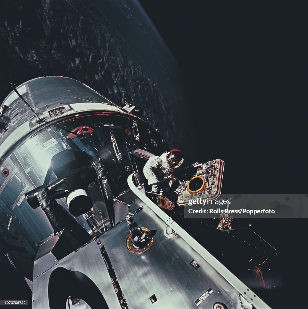 Apollo Spacewalk View of astronaut Rusty Schweickart exiting the Lunar module hatch ...