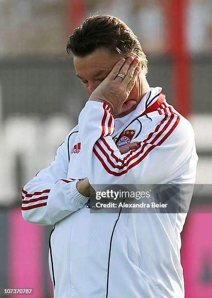 Team coach Louis van Gaal attends a training session of Bayern Muenchen ahead of the Champions League Group E match against FC Basel on December 7,...