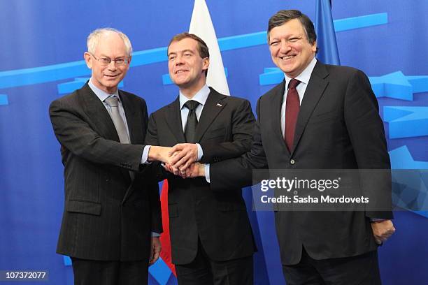 President Herman van Rompuy, Russian President Dmitry Medvedev and EU Commission President Jose Manuel Barroso are seen during a group photo durinng...