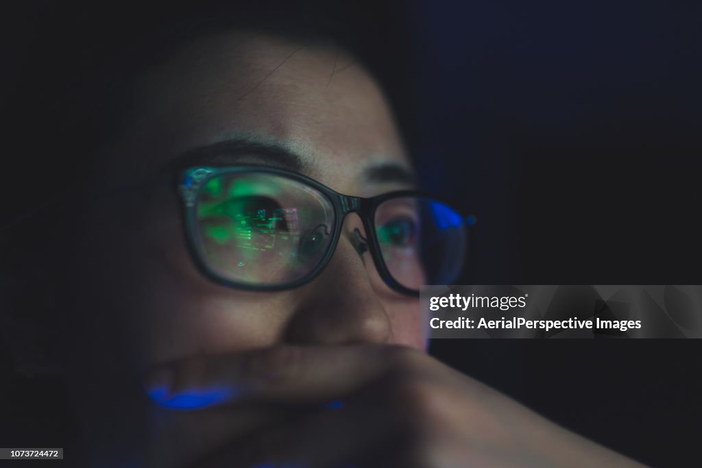 Woman Working at Night