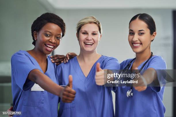 you've got the all clear - nurse thumbs up stock pictures, royalty-free photos & images