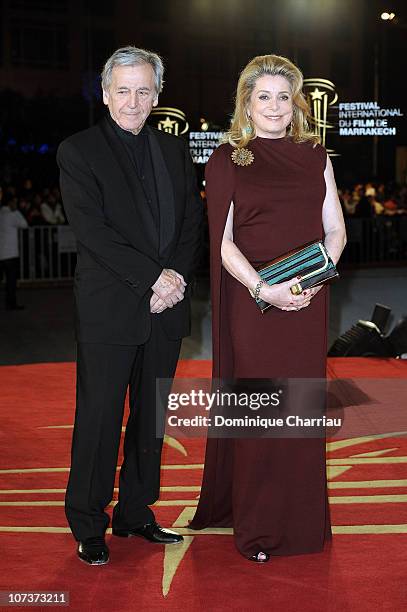 Actress Catherine Deneuve and Director Costa Gavras attend the Tribute to the French Cinema during the 10 th Marrakech Film Festival on December 4,...