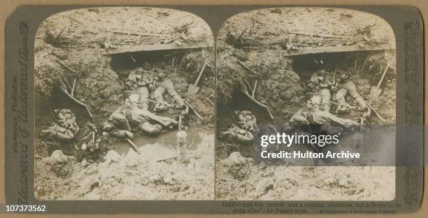 Stereo card image of the bodies of dead German soldiers in a trench near La Bassee in northern France, during World War I, circa 1917.