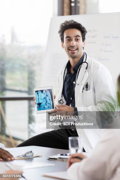 male neurologist gives presentation - neurologist stock pictures, royalty-free photos & images