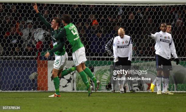 Sebastian Proedl of Bremen celebrates after he scores his team's opening goal during the UEFA Champions League group A match between SV Werder Bremen...