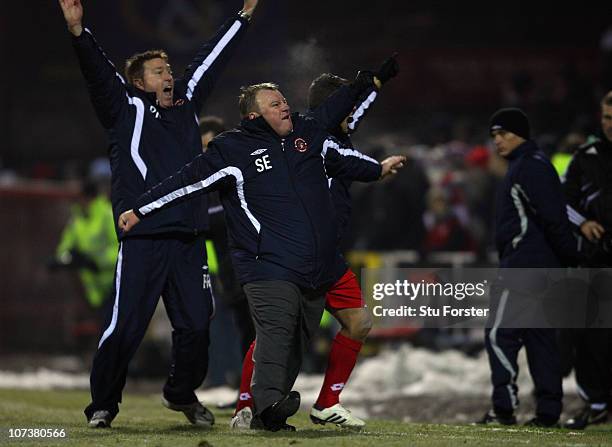 Crawley Town manager Steve Edwards celebrates on the final whistle after the FA Cup 2nd Round Replay between Swindon Town and Crawley Town at City...