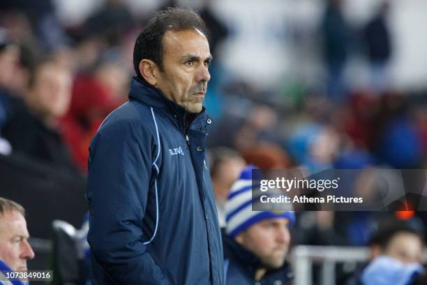 Jos Luhukay, manager for Sheffield Wednesday watches the game from the technical area during the Sky Bet Championship match between Swansea City and...