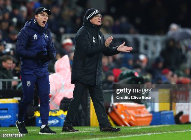 Claudio Ranieri, Manager of Fulham and Scott Parker Assistant Manager of Fulham, give their team instructions during the Premier League match between...