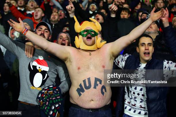 Newcastle United fan supports his team during the Premier League match between Huddersfield Town and Newcastle United at John Smith's Stadium on...